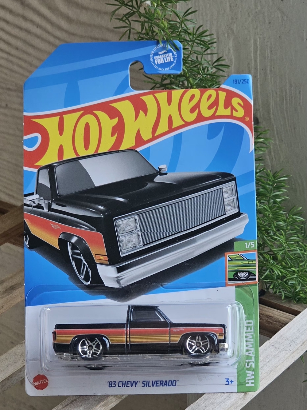 Hot Wheels '83 Chevy Silverado Toy Truck - Black with Red-Orange-Yellow Stripes